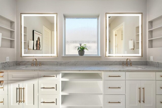 131 Katie Dr, Austin, TX 78737 - full bath with double vanity and healthy amount of natural light