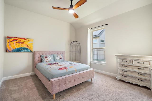 131 Katie Dr, Austin, TX 78737 - bedroom featuring light carpet, vaulted ceiling, and ceiling fan
