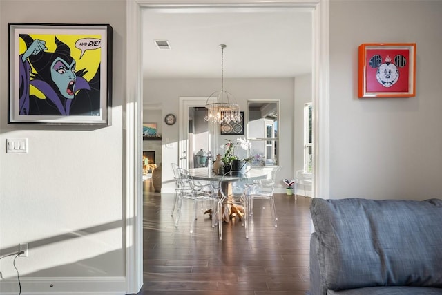131 Katie Dr, Austin, TX 78737 - dining room with a chandelier and wood finished floors