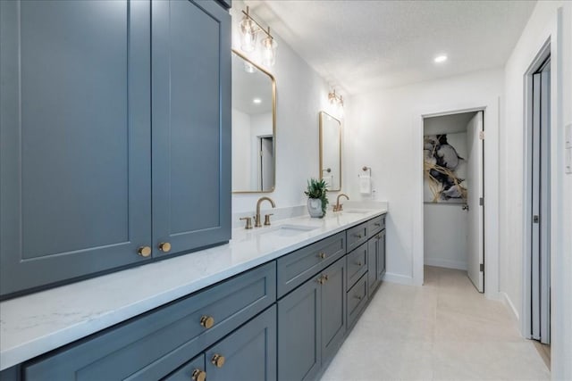11202 Alhambra Dr, Austin, TX 78759 - full bathroom with double vanity and recessed lighting