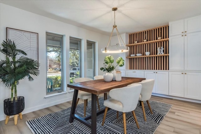 11202 Alhambra Dr, Austin, TX 78759 - dining space with light wood-style floors and baseboards