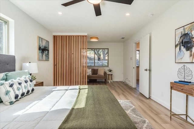 11202 Alhambra Dr, Austin, TX 78759 - bedroom with light wood finished floors, recessed lighting, and a ceiling fan