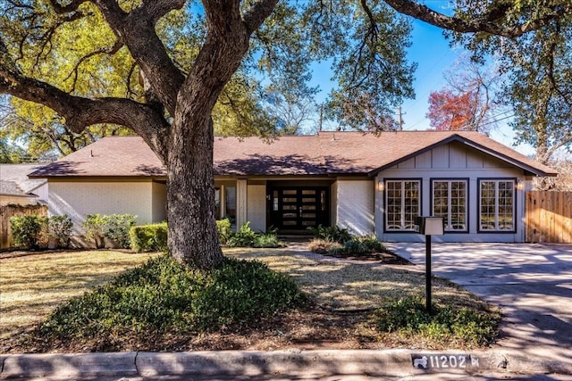 11202 Alhambra Dr, Austin, TX 78759 - view of front of home with french doors and brick siding