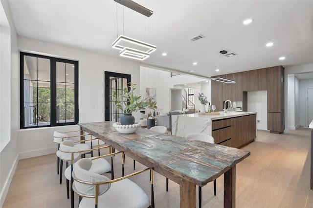 3206 Marshall Ave, Lago Vista, TX 78645 - dining area featuring recessed lighting and light wood-style floors