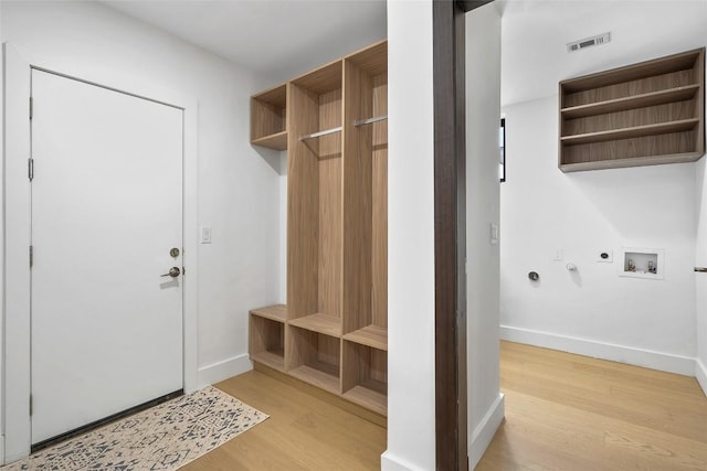 3206 Marshall Ave, Lago Vista, TX 78645 - mudroom with light wood-style floors and baseboards