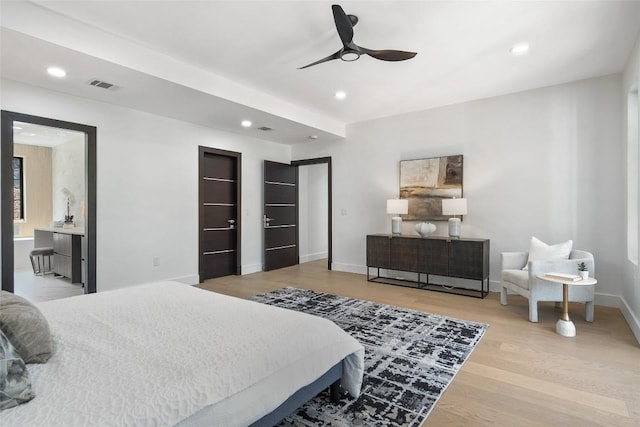 3206 Marshall Ave, Lago Vista, TX 78645 - bedroom with wood finished floors, recessed lighting, and ceiling fan