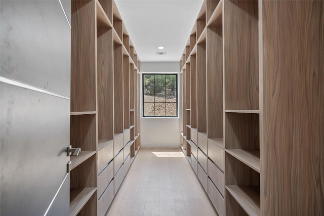 3206 Marshall Ave, Lago Vista, TX 78645 - walk in closet with light wood-style flooring