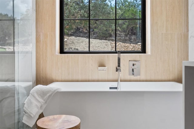 3206 Marshall Ave, Lago Vista, TX 78645 - full bathroom with a freestanding tub and plenty of natural light