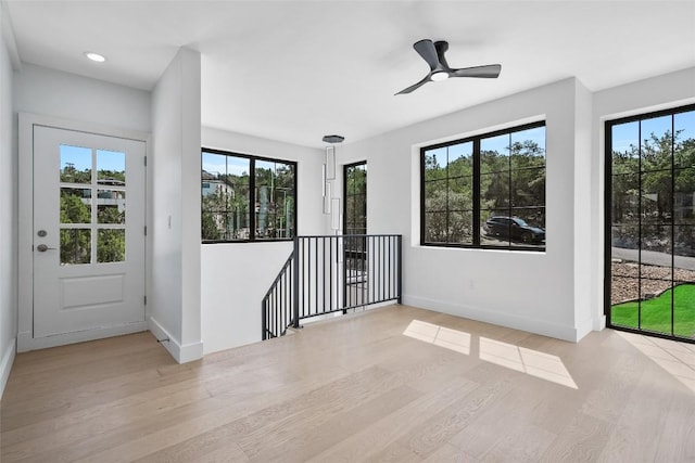 3206 Marshall Ave, Lago Vista, TX 78645 - spare room featuring wood finished floors, ceiling fan, and recessed lighting