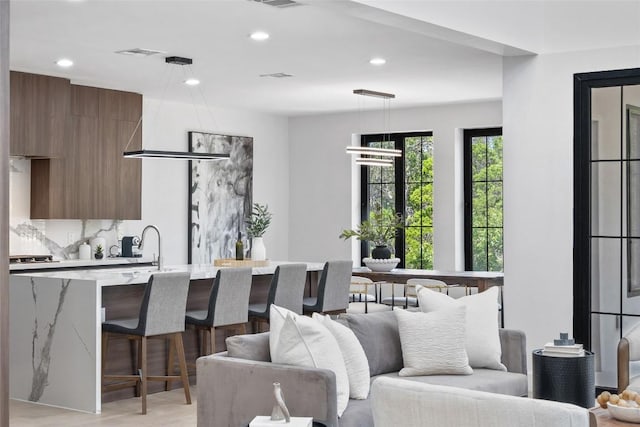 3206 Marshall Ave, Lago Vista, TX 78645 - living area featuring recessed lighting and light wood-style floors