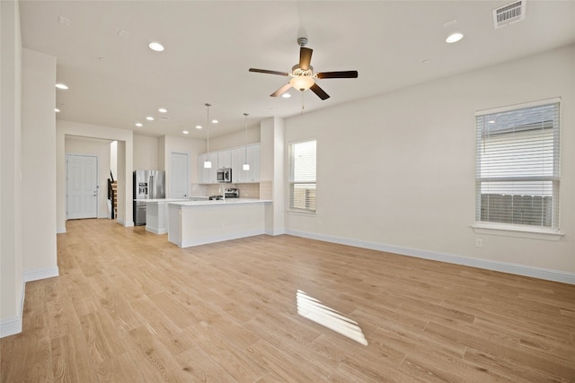 600 C-Bar Ranch Trl Unit 108, Cedar Park, TX 78613 - unfurnished living room featuring recessed lighting, ceiling fan, and light wood-type flooring
