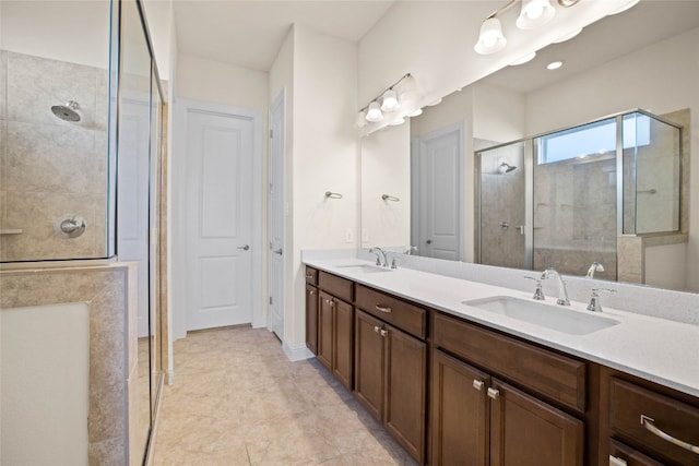 600 C-Bar Ranch Trl Unit 108, Cedar Park, TX 78613 - bathroom featuring a stall shower, double vanity, and tile patterned floors