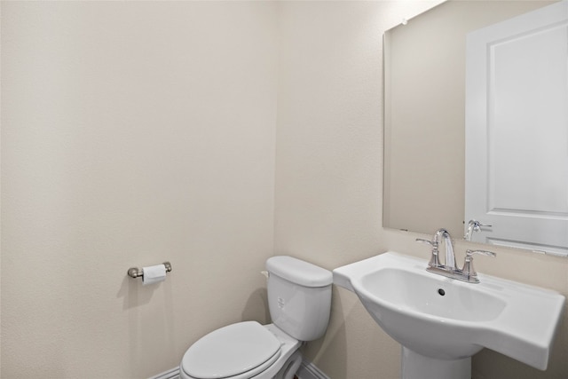 600 C-Bar Ranch Trl Unit 108, Cedar Park, TX 78613 - half bathroom with toilet and a sink