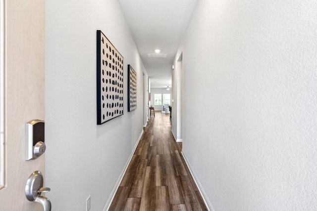 207 El Capitan Loop, Dripping Springs, TX 78620 - hallway featuring dark wood-type flooring and recessed lighting