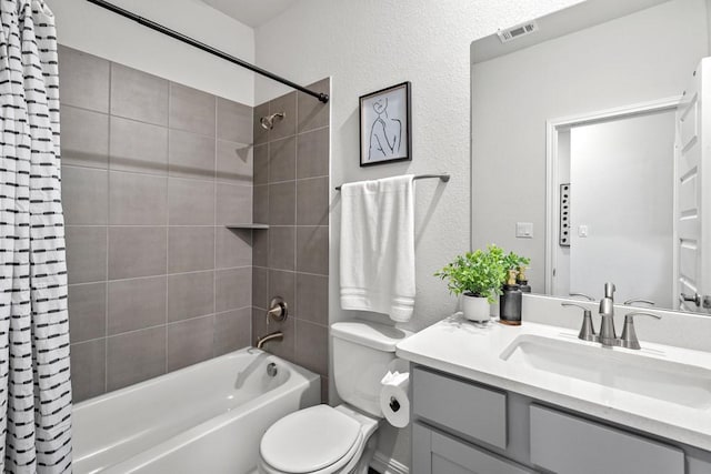 207 El Capitan Loop, Dripping Springs, TX 78620 - full bathroom with shower / bathtub combination with curtain, vanity, and a textured wall