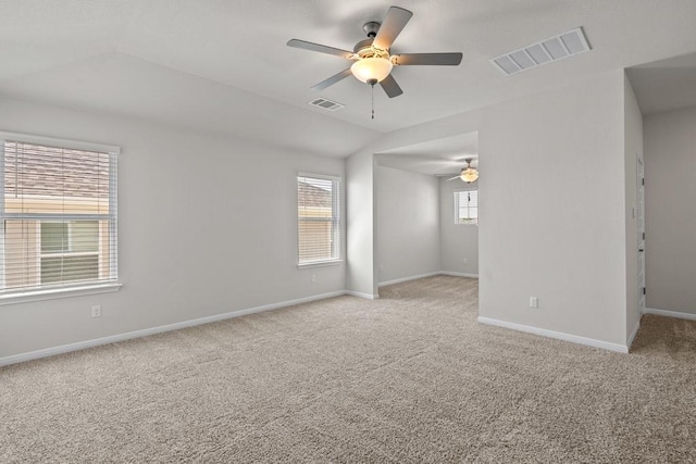 207 El Capitan Loop, Dripping Springs, TX 78620 - spare room with a ceiling fan, light colored carpet, and lofted ceiling