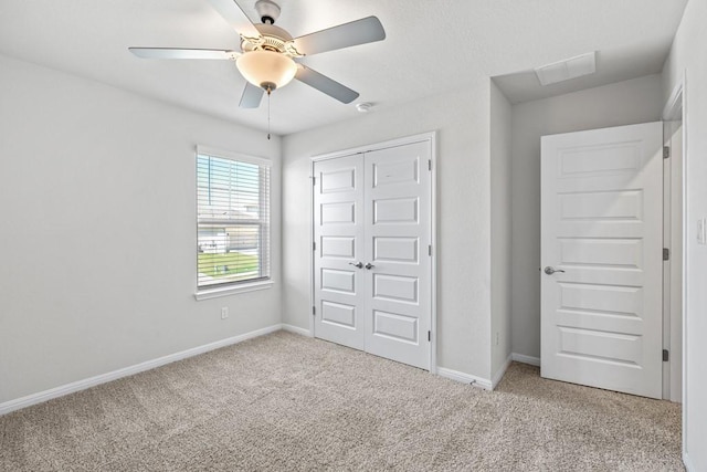 207 El Capitan Loop, Dripping Springs, TX 78620 - unfurnished bedroom featuring carpet flooring, a closet, and ceiling fan