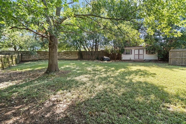 3121 Yandall Dr, Austin, TX 78748 - fenced backyard featuring a storage shed