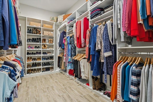 202 Iron Rail Ln, Georgetown, TX 78633 - walk in closet featuring wood finished floors