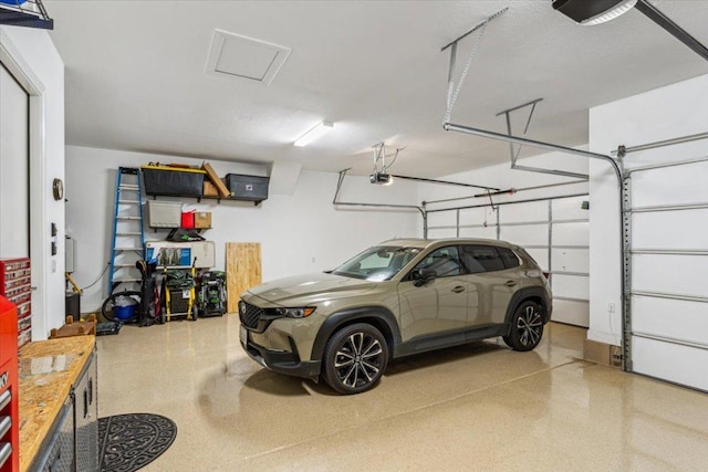 202 Iron Rail Ln, Georgetown, TX 78633 - garage featuring a garage door opener