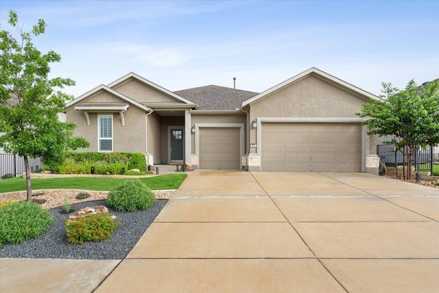 202 Iron Rail Ln, Georgetown, TX 78633 - ranch-style house with a garage, stucco siding, and concrete driveway