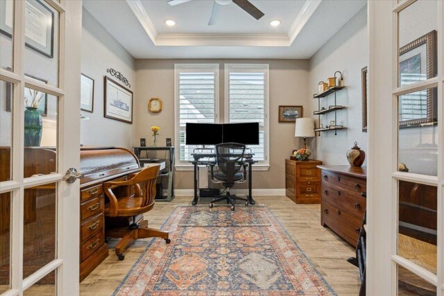 202 Iron Rail Ln, Georgetown, TX 78633 - home office featuring light wood-style floors, a ceiling fan, crown molding, a raised ceiling, and recessed lighting