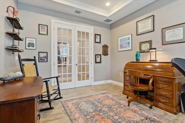 202 Iron Rail Ln, Georgetown, TX 78633 - office area with french doors, light wood-style floors, ornamental molding, and a tray ceiling