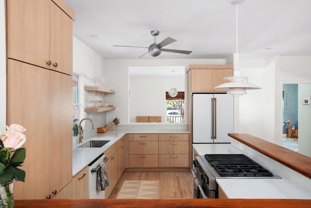 1608 Hether St, Austin, TX 78704 - kitchen featuring light brown cabinets, light countertops, and freestanding refrigerator