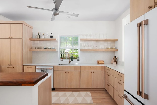 1608 Hether St, Austin, TX 78704 - kitchen with high end fridge, light brown cabinets, dishwasher, and open shelves