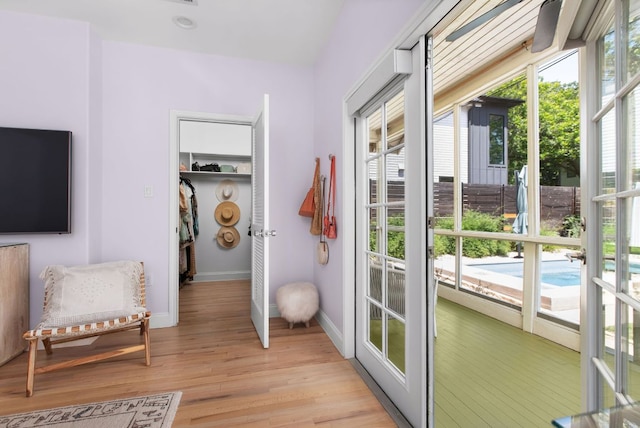 1608 Hether St, Austin, TX 78704 - doorway featuring healthy amount of natural light, light wood-style flooring, and french doors