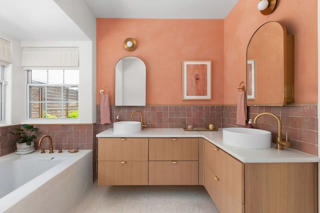 1608 Hether St, Austin, TX 78704 - full bath featuring double vanity, a garden tub, and decorative backsplash