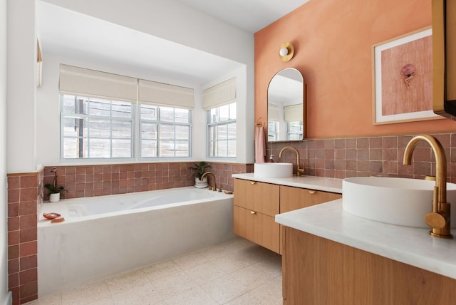 1608 Hether St, Austin, TX 78704 - full bathroom with double vanity, a bath, tile patterned floors, and tile walls