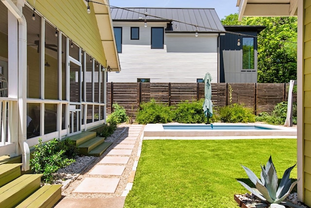 1608 Hether St, Austin, TX 78704 - fenced backyard with entry steps and a sunroom
