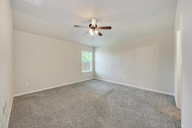 486 Nottingham Loop, Kyle, TX 78640 - empty room with carpet and a ceiling fan