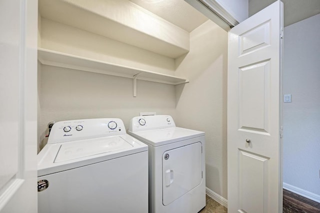 486 Nottingham Loop, Kyle, TX 78640 - washroom with independent washer and dryer and dark wood-style flooring