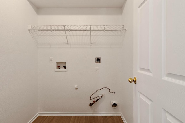 2733 Crimson Sky Ct, Round Rock, TX 78665 - washroom featuring hookup for a gas dryer, washer hookup, electric dryer hookup, and wood finished floors