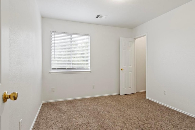 2733 Crimson Sky Ct, Round Rock, TX 78665 - carpeted empty room with baseboards