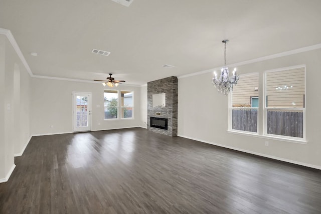 12505 Franklin D Roosevelt St, Manor, TX 78653 - unfurnished living room with ornamental molding, a fireplace, a chandelier, dark wood-type flooring, and a ceiling fan