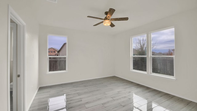 12505 Franklin D Roosevelt St, Manor, TX 78653 - unfurnished room featuring a ceiling fan and wood finished floors