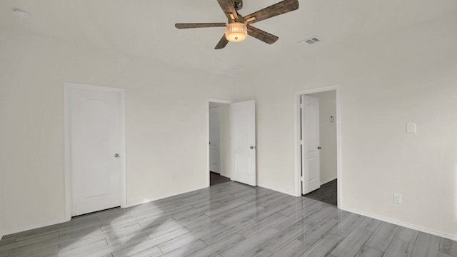 12505 Franklin D Roosevelt St, Manor, TX 78653 - empty room with a ceiling fan and wood finished floors