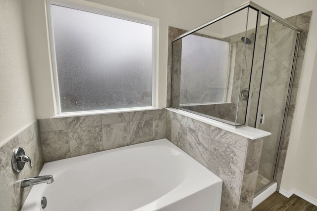 12505 Franklin D Roosevelt St, Manor, TX 78653 - full bath with a shower stall and a garden tub