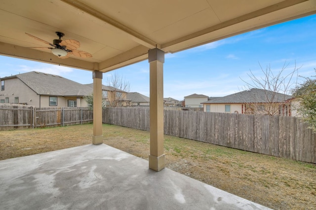 12505 Franklin D Roosevelt St, Manor, TX 78653 - fenced backyard featuring a ceiling fan, a patio area, and a residential view