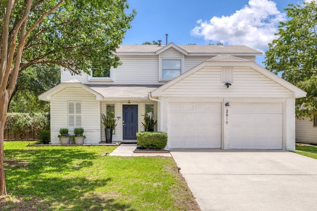 2616 Aylesbury Ln, Austin, TX 78745 - traditional home with driveway, a garage, a front lawn, and roof with shingles