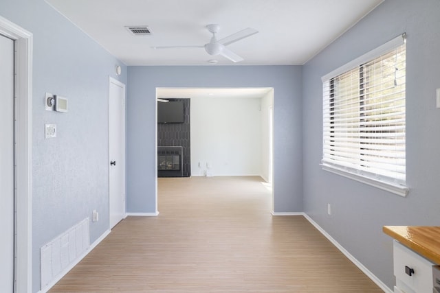 2616 Aylesbury Ln, Austin, TX 78745 - hall featuring light wood-style flooring and baseboards