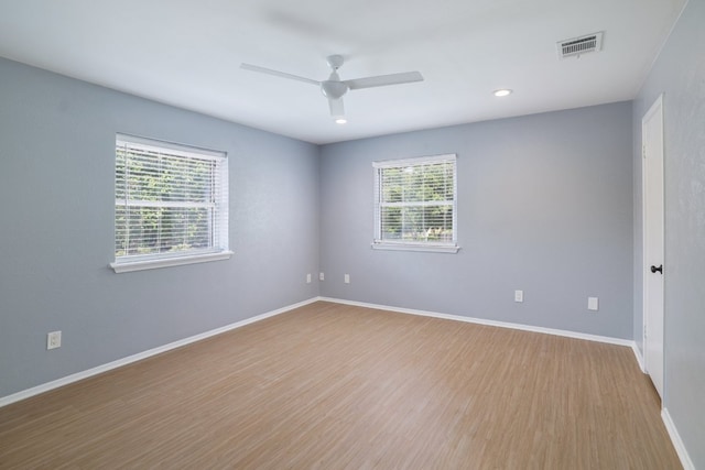 2616 Aylesbury Ln, Austin, TX 78745 - unfurnished room featuring wood finished floors, a ceiling fan, and recessed lighting