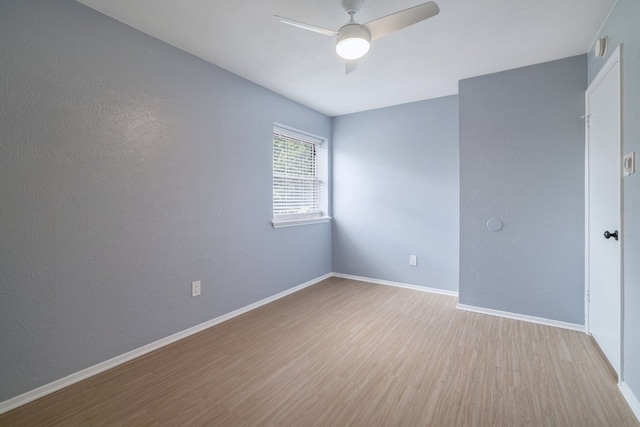 2616 Aylesbury Ln, Austin, TX 78745 - empty room featuring a ceiling fan and wood finished floors