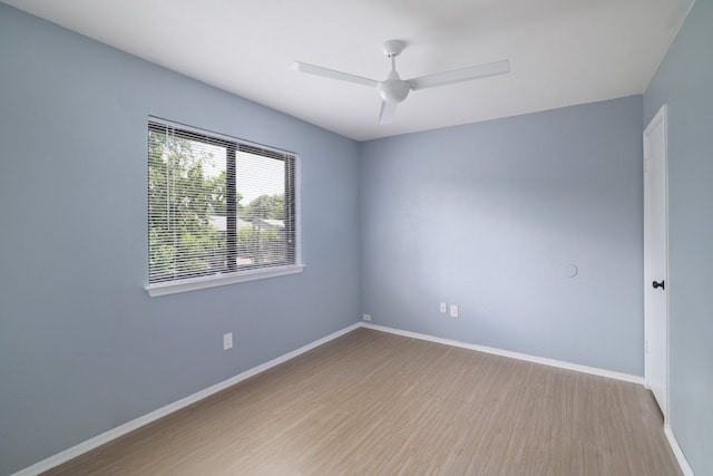 2616 Aylesbury Ln, Austin, TX 78745 - empty room featuring wood finished floors and a ceiling fan