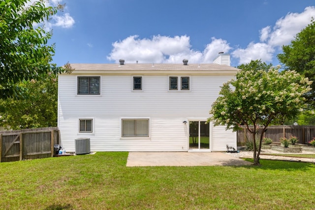 2616 Aylesbury Ln, Austin, TX 78745 - back of property featuring a patio area, a fenced backyard, and a chimney