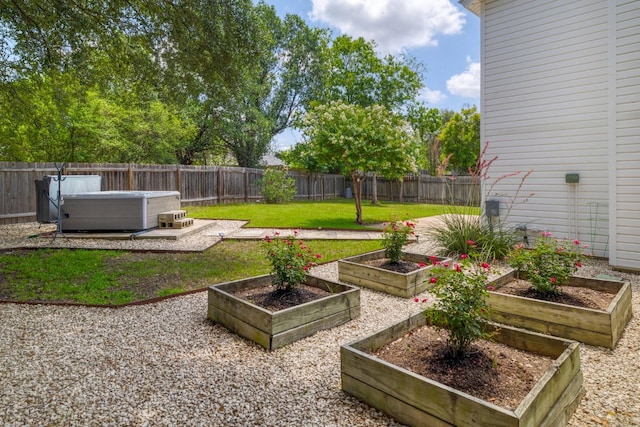 2616 Aylesbury Ln, Austin, TX 78745 - fenced backyard with a garden and a patio
