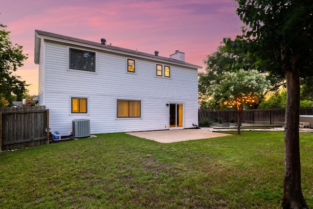 2616 Aylesbury Ln, Austin, TX 78745 - back of house with a patio, a chimney, and a fenced backyard